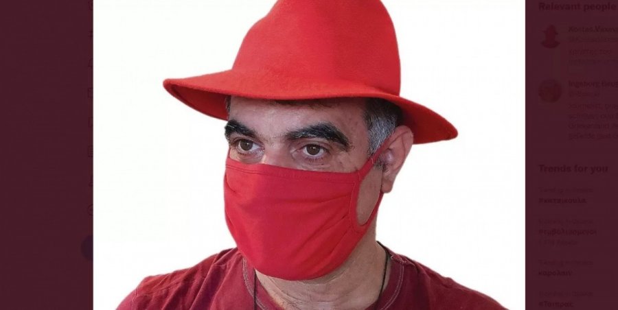 Ο Βαξεβάνης έβαλε κόκκινο καπέλο και κόκκινη μάσκα και δηλώνει υποστήριξη στην Ολλανδή δημοσιογράφο